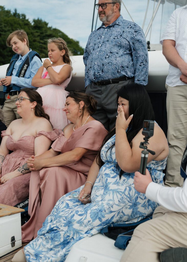 family on couples sailboat elopement in halifax